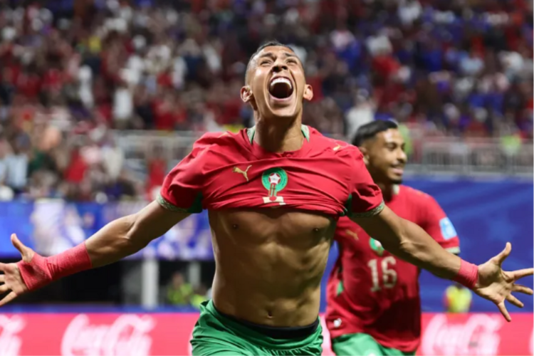 Morocco come back after historic Haiti goals to reach World Cup last 32