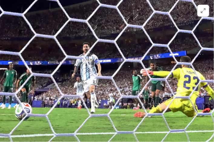 Messi hat-trick equals scoring record as Argentina dazzle against Algeria