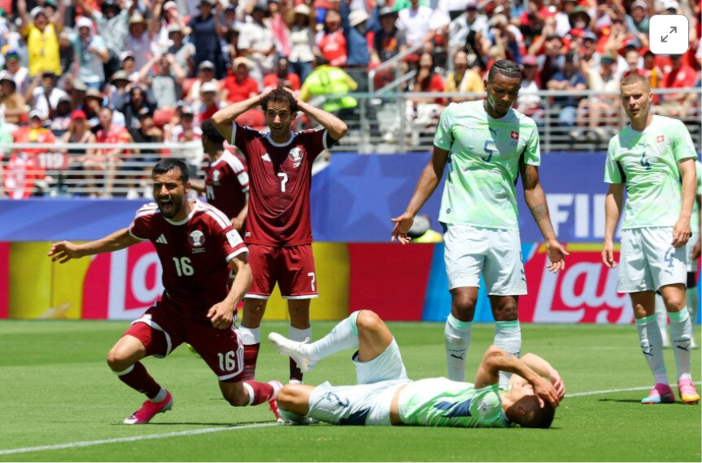 Qatar score late to clinch draw with stunned Switzerland 
